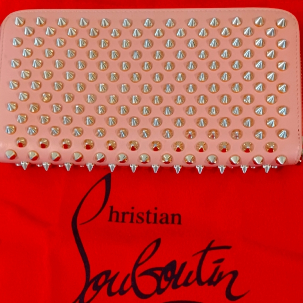Pink spiked Christian Louboutin wallet